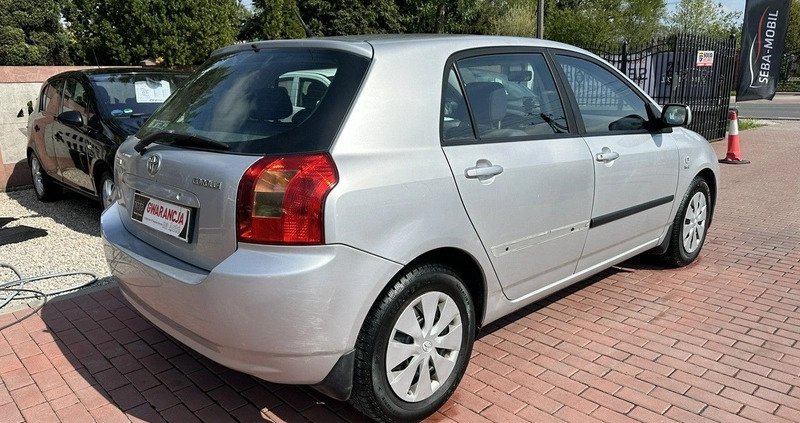 Toyota Corolla cena 8800 przebieg: 175000, rok produkcji 2003 z Głubczyce małe 137